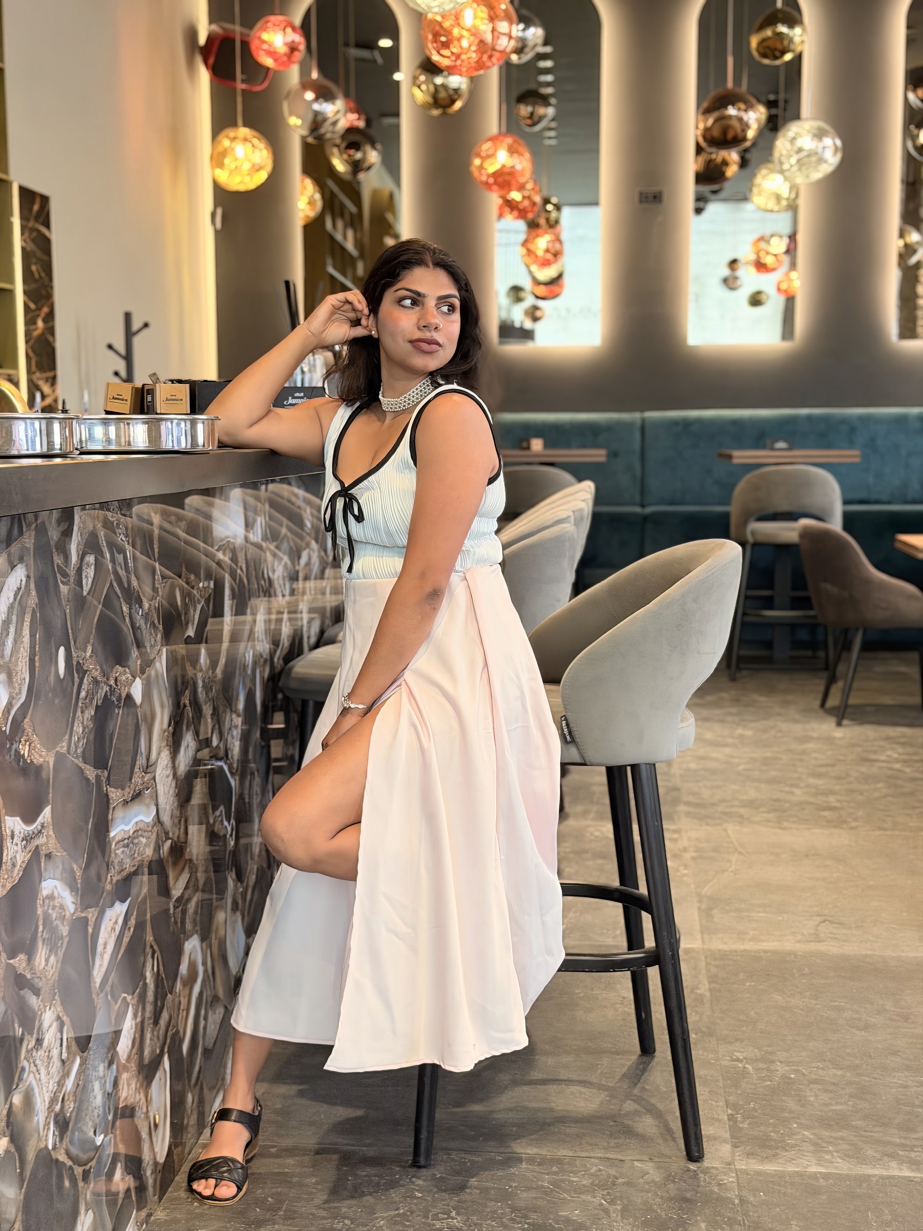 Vandana styled at an elegant hotel bar